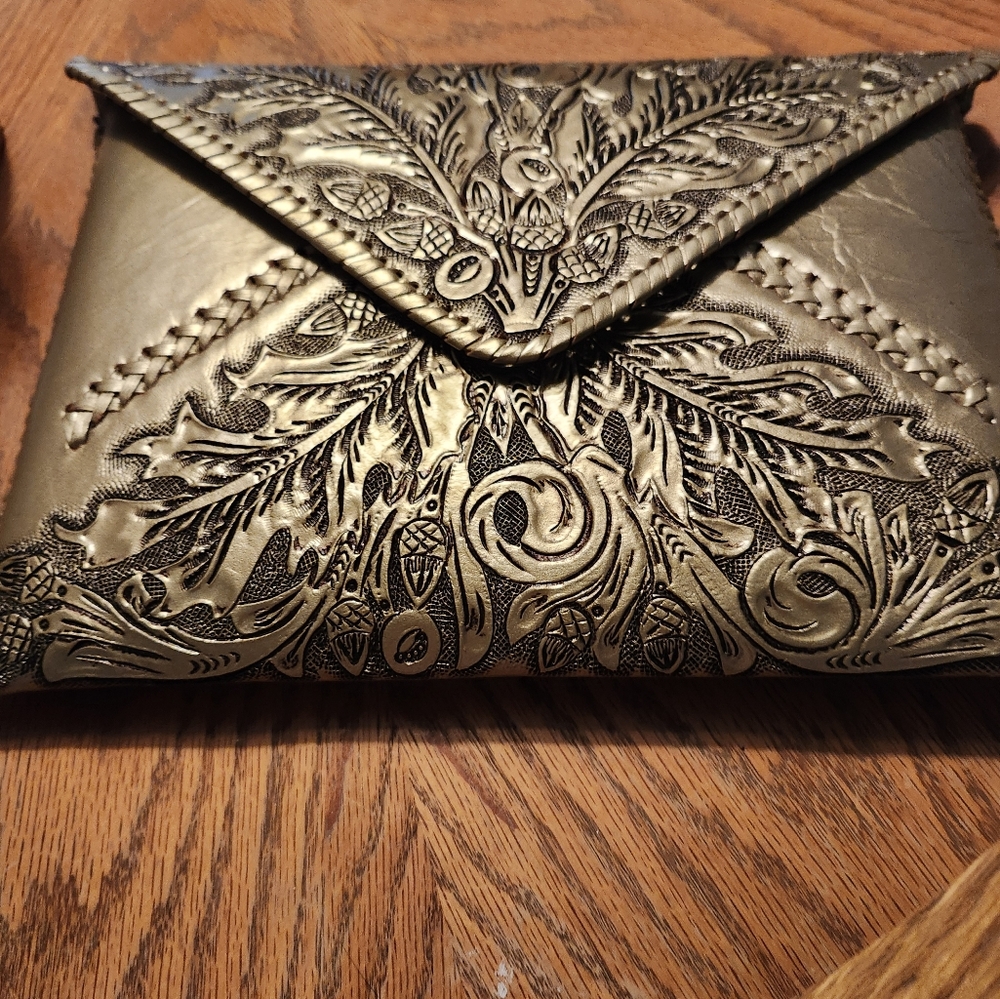 Origene Embossed or carved gold shoulder bag